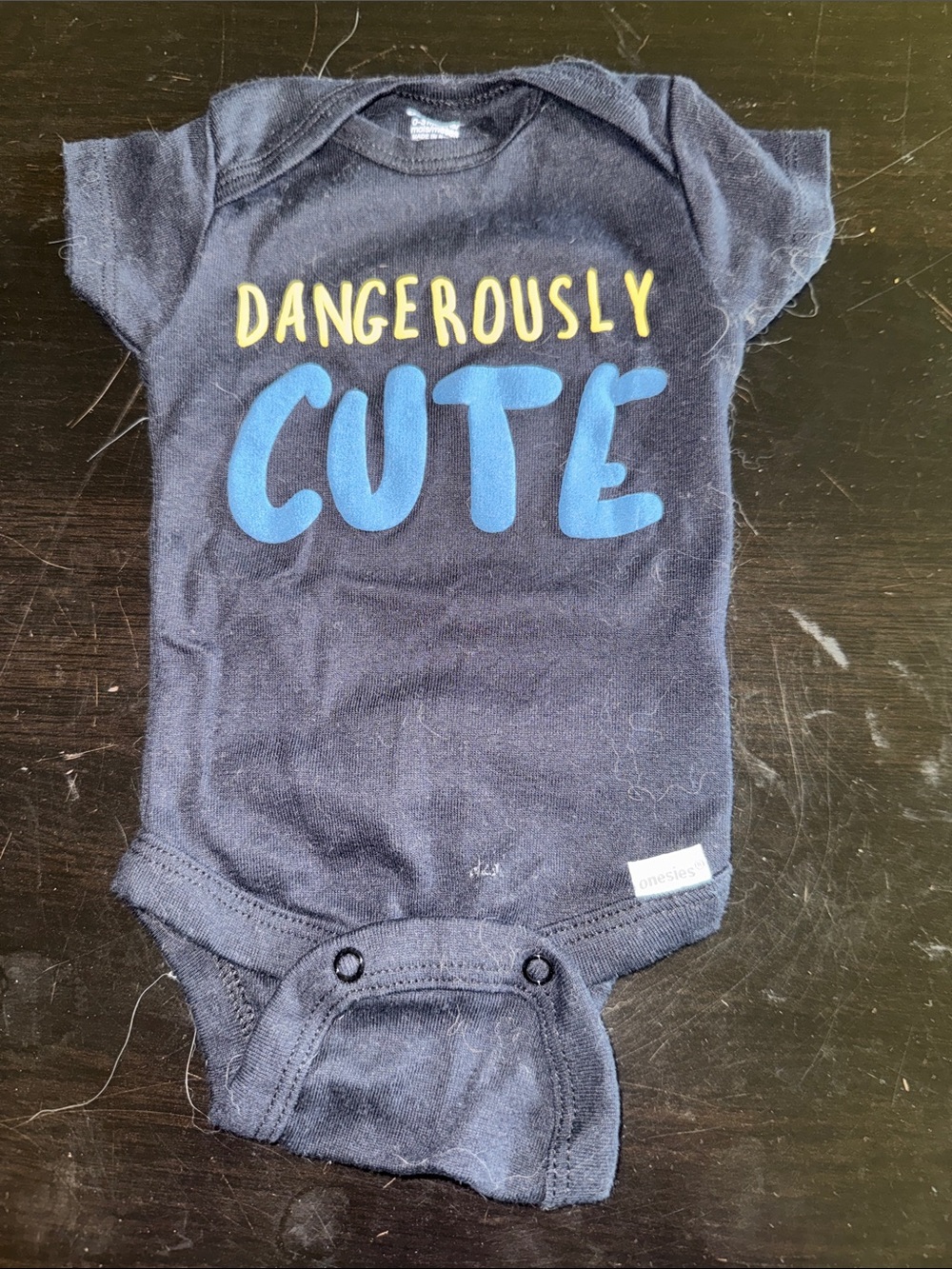 Navy "Dangerously Cute" Baby One-Piece Bodysuit